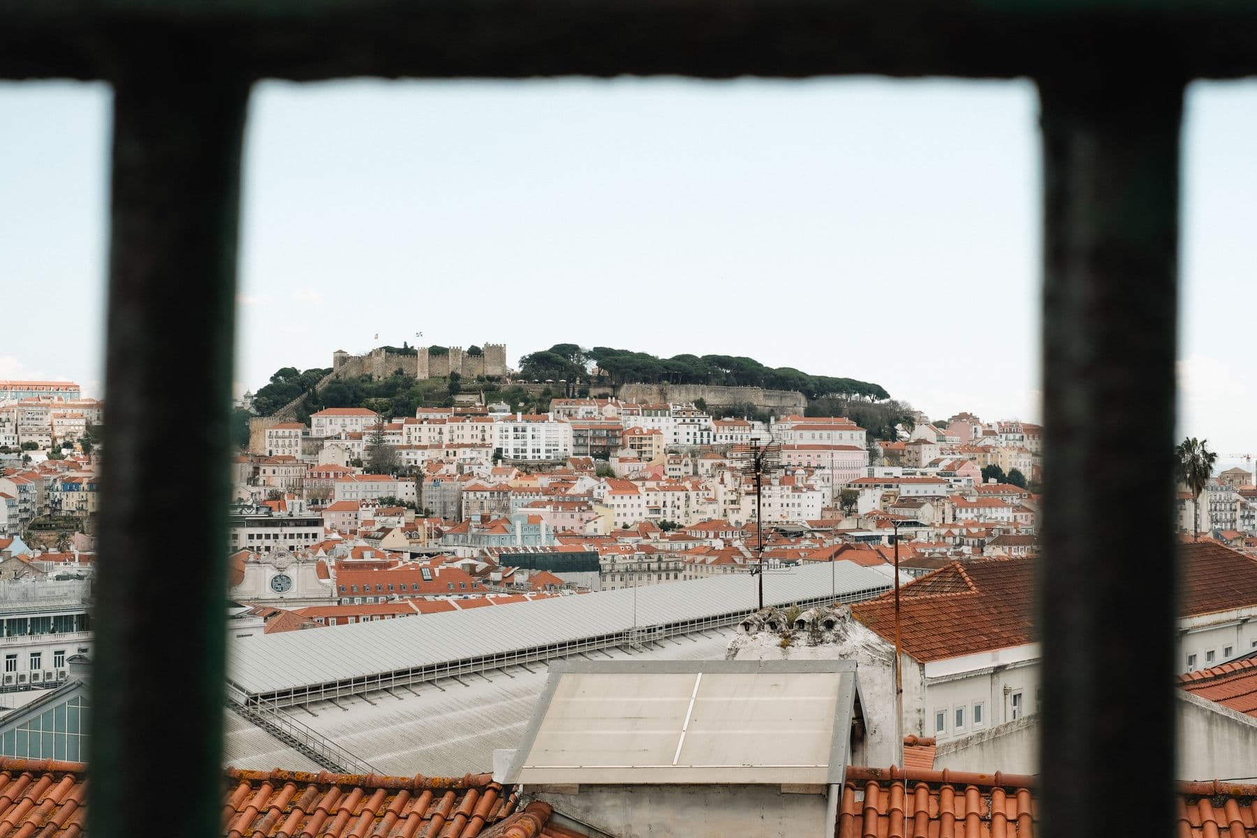 Terracotta rooftops across Lisbon seen from above
